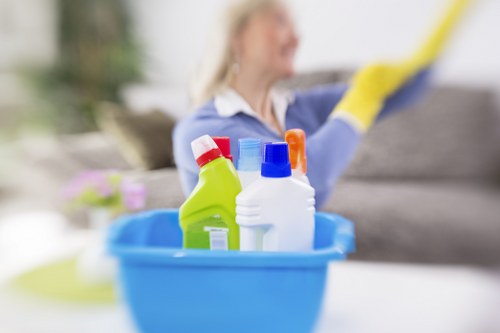 Local cleaner preparing a guest-ready property in SW2