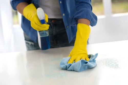 Local cleaning team working in a SW2 rental property before move-out